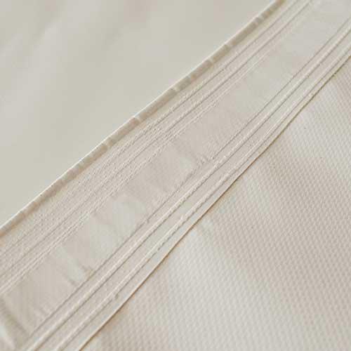 Tessuto PVC su misura con bordatura e occhielli - Resta Tendaggi
